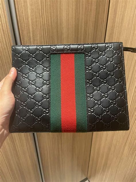 gucci leather portfolios|Gucci men clutch.